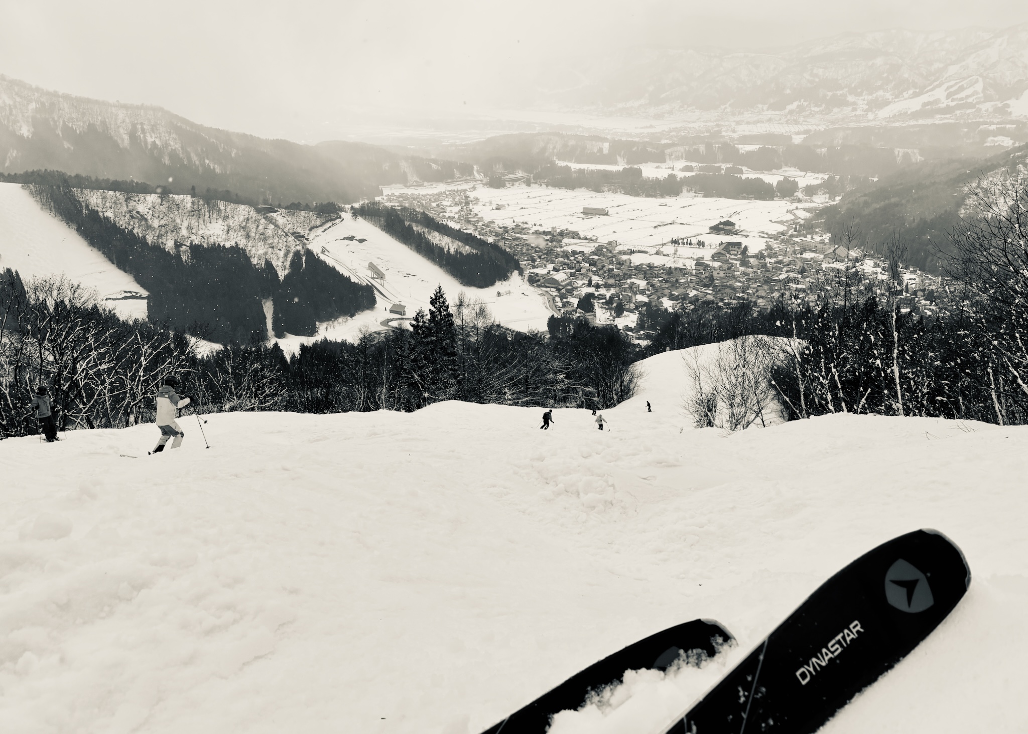 The run down toward the village, Dynastar ski tip, black and white