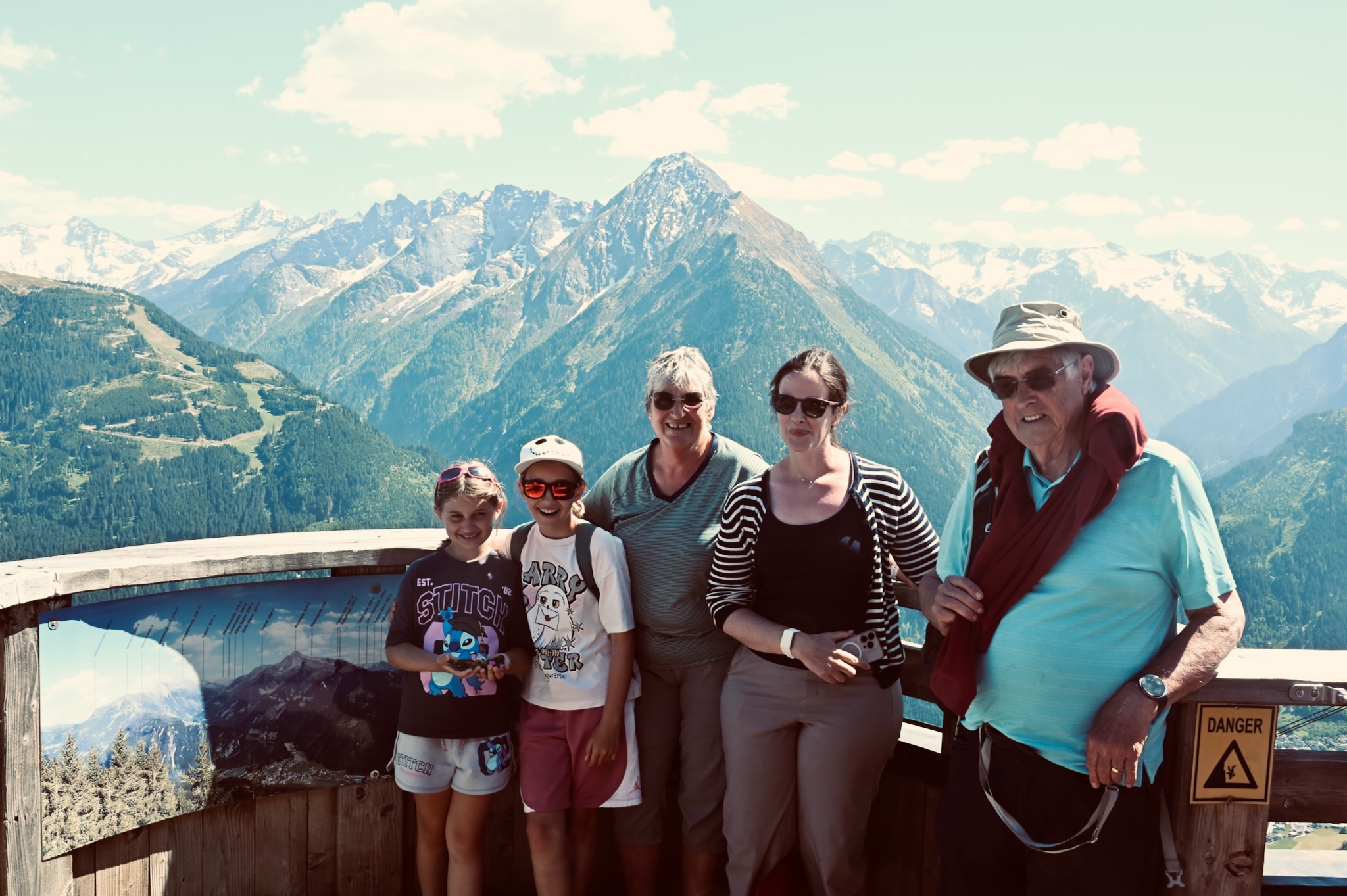 The whole family at a mountain viewpoint