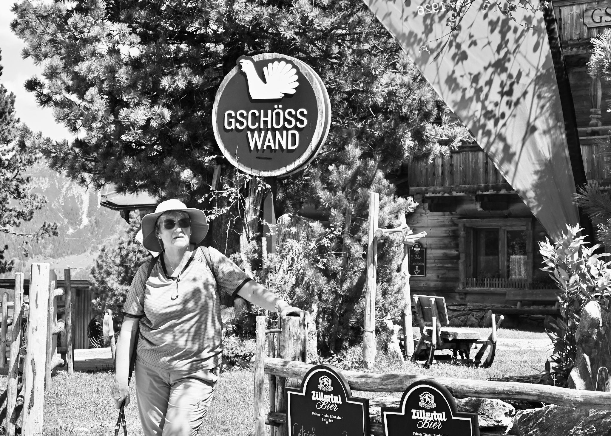 My mother by the Gschöss Wand sign, black and white