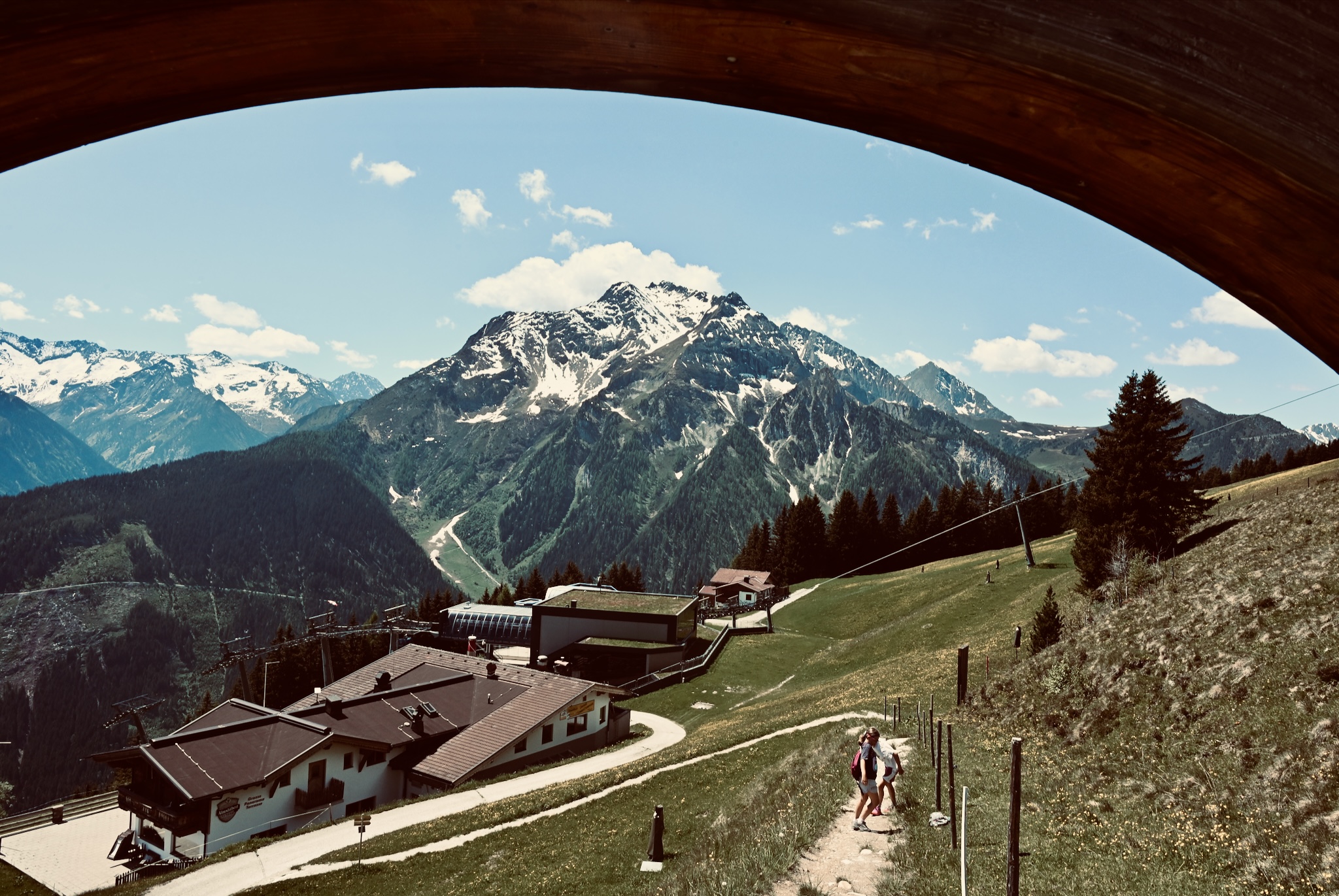 The valley framed through a timber arch
