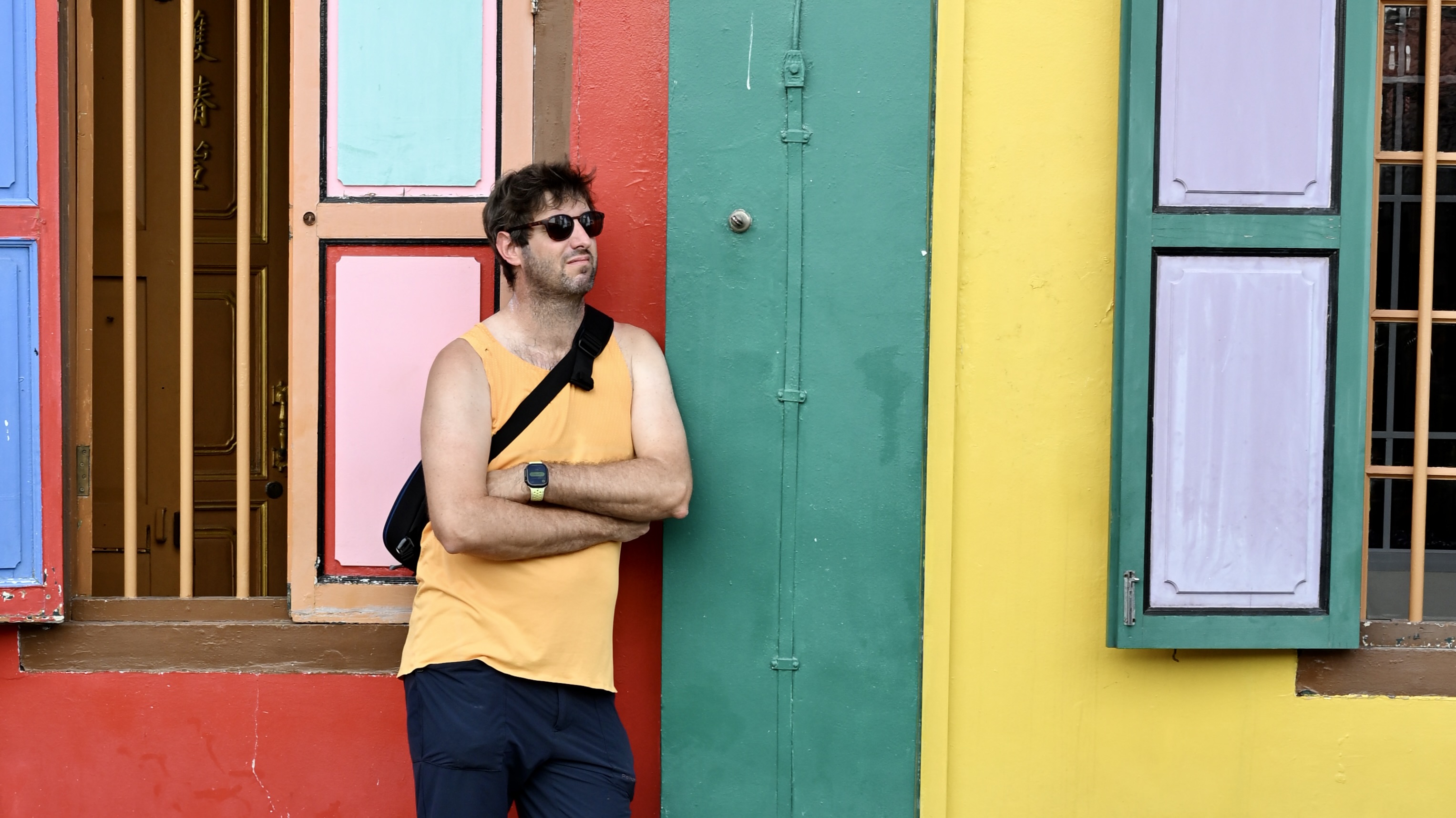 Matt Dalby against the shophouse colours of Little India, Singapore