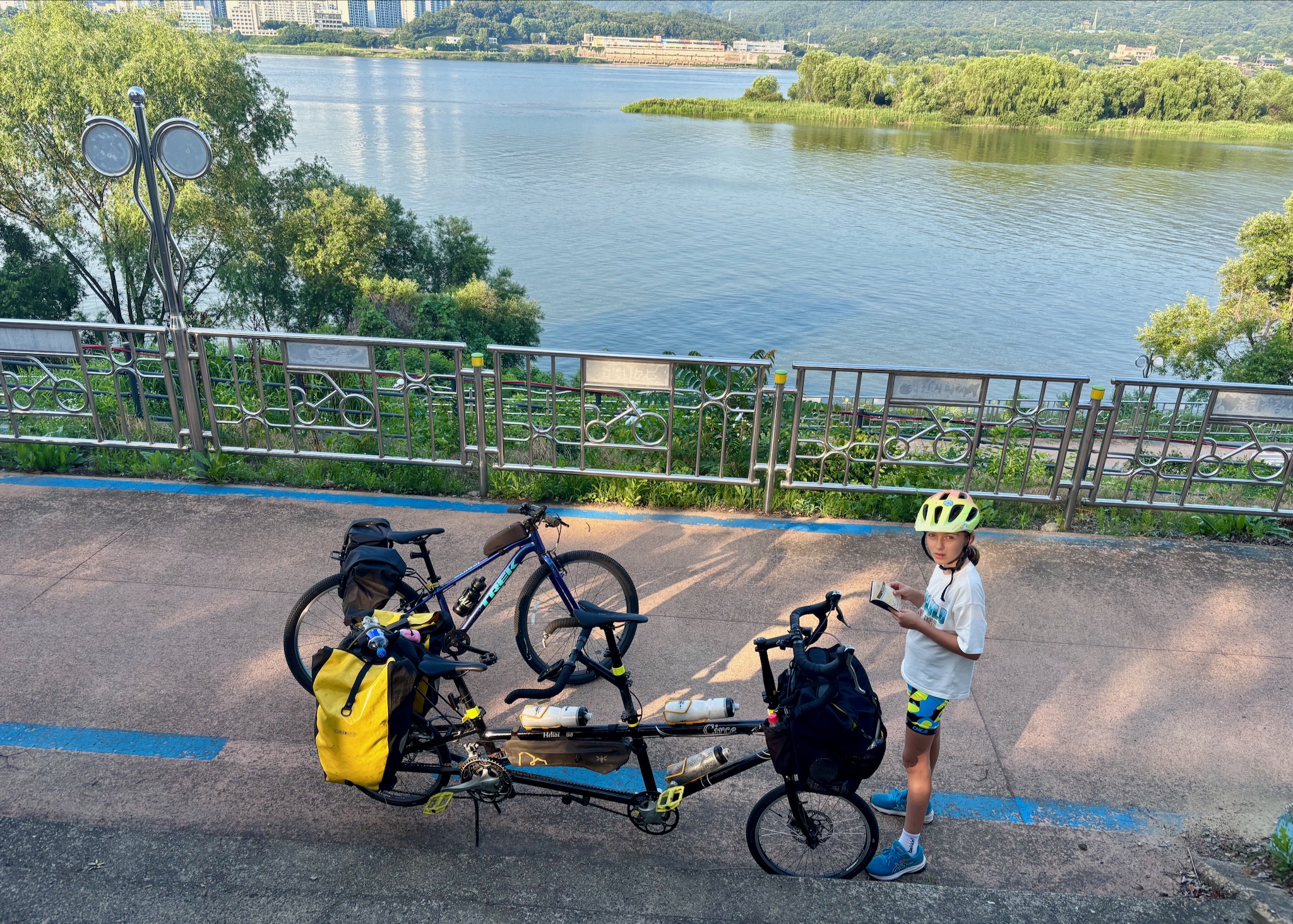 Reading the route map at a river overlook