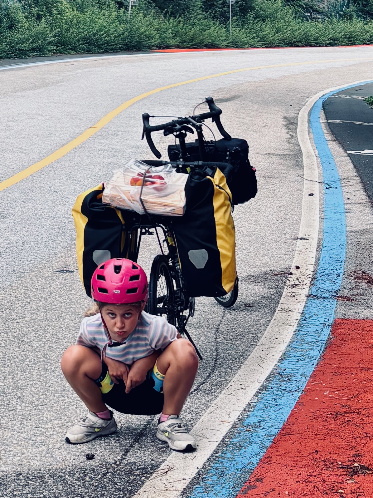 A well-earned sit-down by the loaded bike