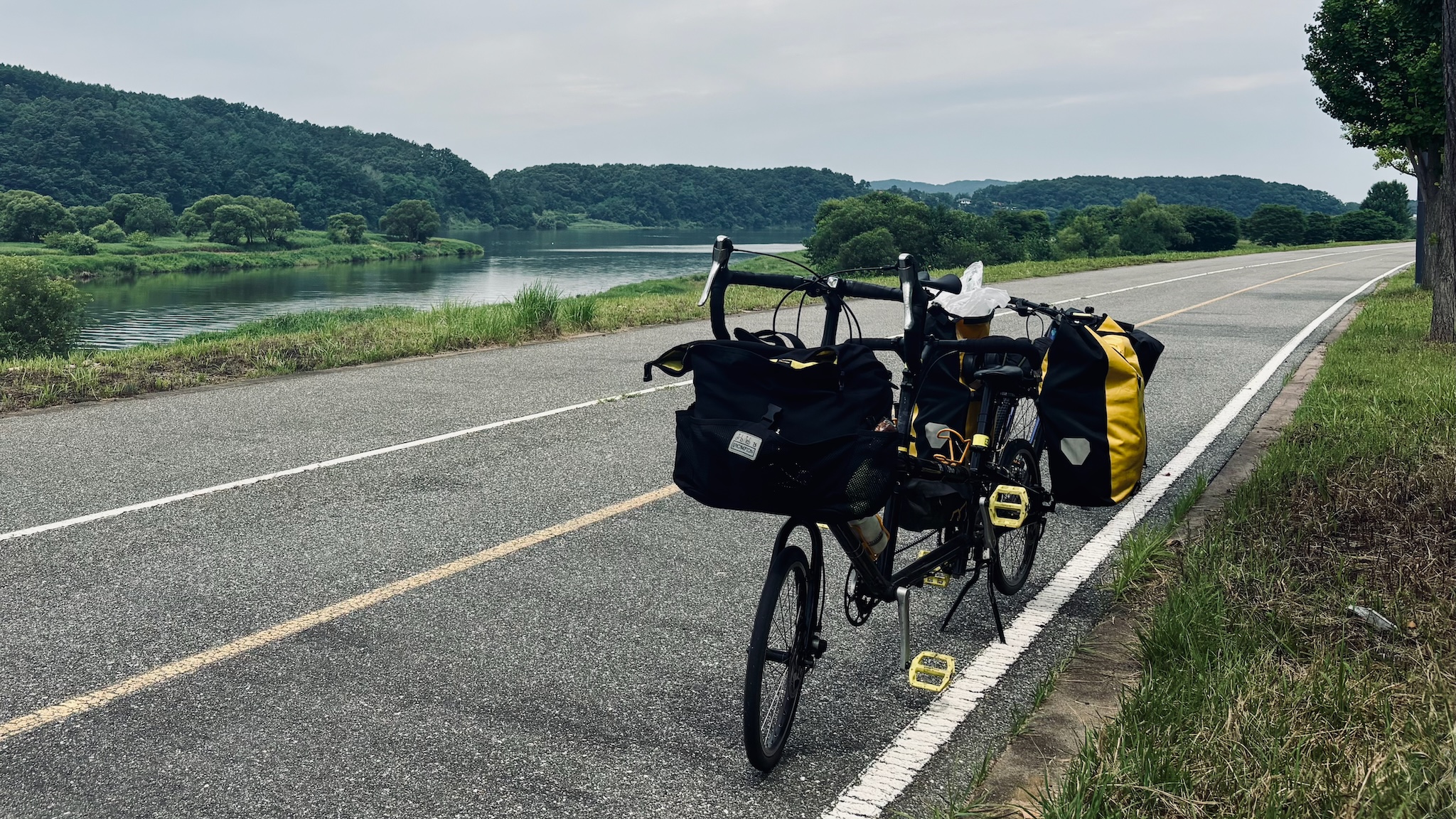 The fully loaded Circe Helios tandem parked by the river road